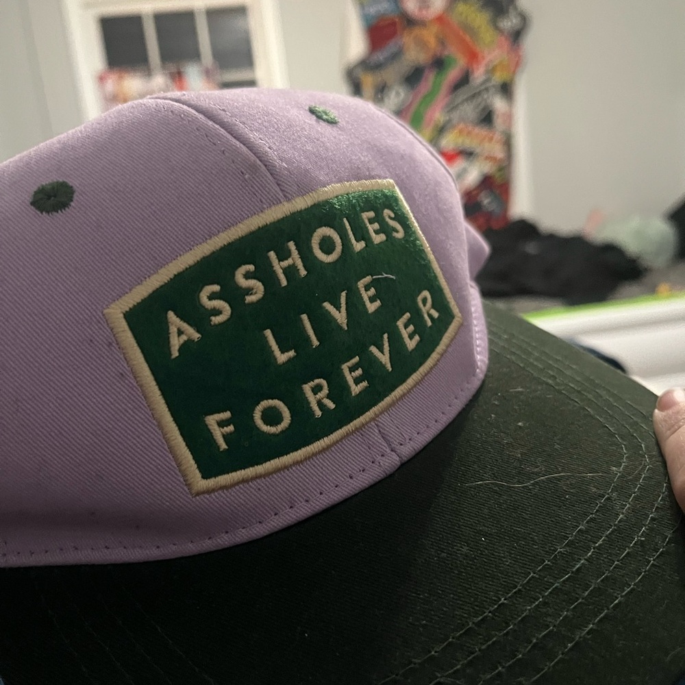 Purple and Green Cap with Bold Statement